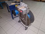 a machine that is sitting on the floor in a room