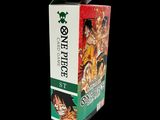 a box of one piece figurines sitting on a table