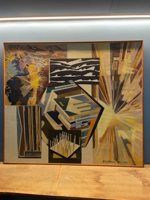une image d'un tableau accroché au mur d'une pièce