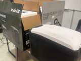 many boxes and boxes on a table in a room