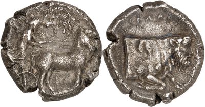 a silver coin with an image of a man on it