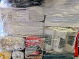 a pallet full of items wrapped up and ready to be loaded