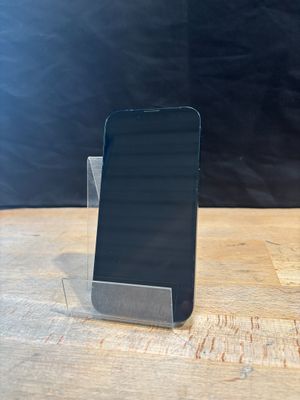 a cell phone that is sitting on a wooden table
