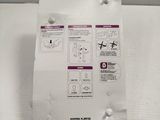 a white box with instructions on it sitting on a table