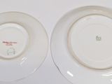 two plates that are sitting side by side on a table