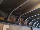 a light that is hanging from the ceiling of a restaurant