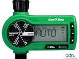 green digital garden timer showing the time and temperature of the garden