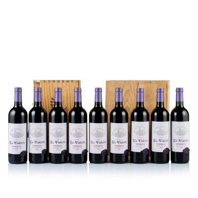 six bouteilles de vin rouge dans un coffret en bois