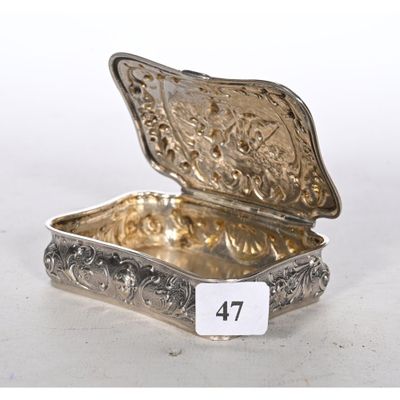 an ornate silver box with a number 47 on the lid