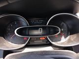 a car dashboard with a speedometer and gauges in it