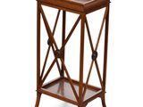 a wooden side table with a glass top and a drawer
