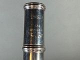 a silver object that is sitting on top of a table