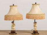 pair of antique table lamps with angel figurines and fringe lampshads