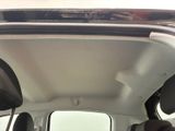 a view of the inside of a car from the passenger seat