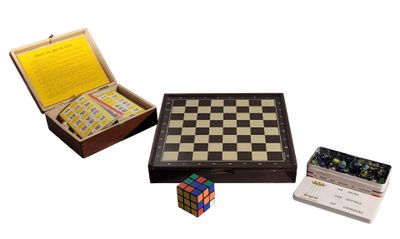 a box that has a chess board and some cards in it