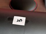 a close up of a black speaker on a table