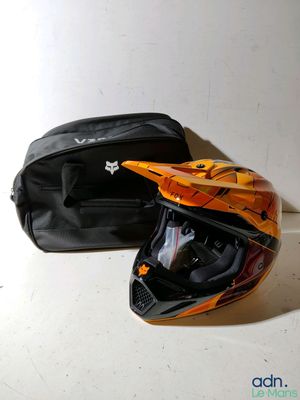 a helmet and a bag sitting on a table