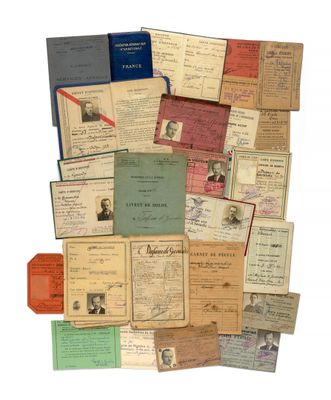 an image of a pile of old papers with old documents on them