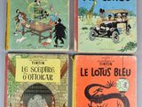 quatre livres pour enfants sont alignés sur une table