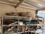 a lot of bags on the shelves in the garage