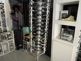 a display of sunglasses on a stand in a store