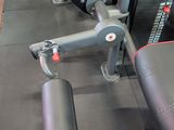 a machine that is sitting on the floor in the gym