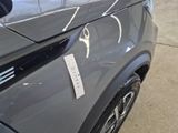 a close up of a car with a sticker on it ' s hood