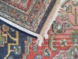 a close up of a rug on the floor
