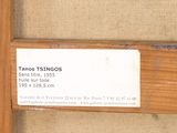 a picture of a wooden frame with a label on it