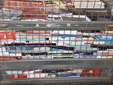 many books in a metal cage on the floor