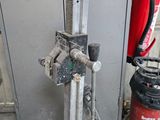 a red fire extinguisher next to a red fire extinguisher