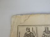 un morceau de papier sur lequel figure la photo d'un homme et d'une femme