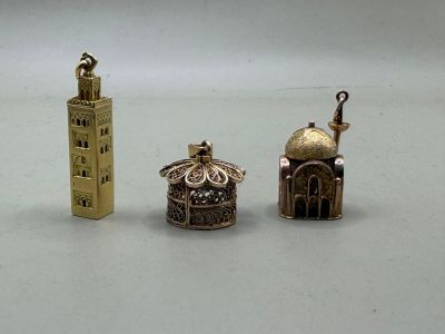 three small objects that are sitting on a table