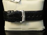 an image of a black and white belt with a tag on it