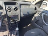 the interior of a car with a steering wheel and dashboard controls