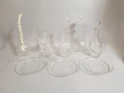 a lot of glass items sitting on a white table