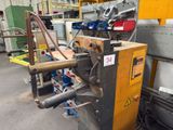 a machine that is sitting inside of a building
