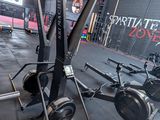 a gym with a lot of equipment in it