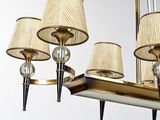 a chandelier with five lamps and a mirror in the background
