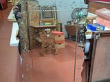 a large mirror sitting on the floor in a room