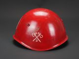 an image of a red helmet with a hammer on the side of it