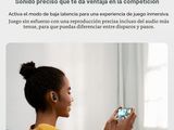 screenshot of a woman sitting on a couch holding a smart phone