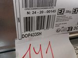 a paper with a barcode on it and a sticker on the side of it