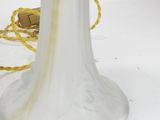 an image of a white glass table lamp with a yellow cord