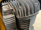 a close up view of a small engine in a garage