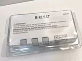 a plastic box with a key on top of it