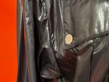 a close up of a black leather jacket on a mannequin mannequin mannequin mannequin mannequin mannequin mannequin mann
