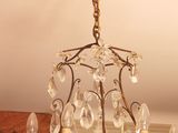 a chandelier hanging from the ceiling in the room