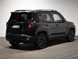 the jeep renegade is parked in a garage with a checkered floor
