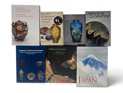 a lot of books that are sitting on a table